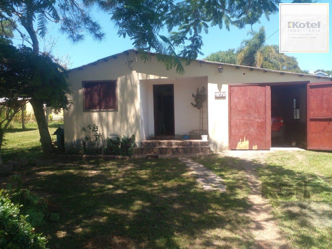 Dois quartos, 01 banheiro, 01 sala de star, 01 sala de jantar, cozinha, 01 garagem para três carros com churrasqueira. — foto 3