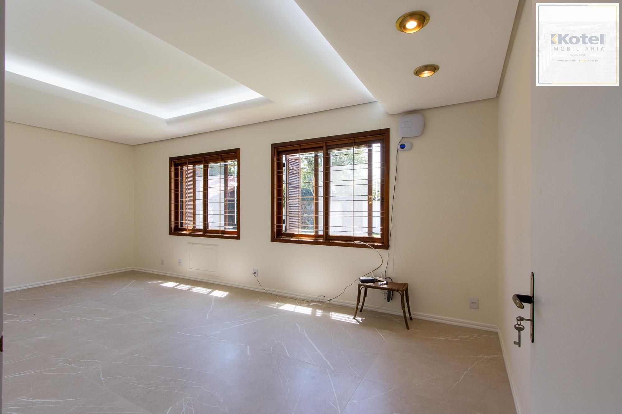 Casa com 2 dormitórios 3 banheiros. lareira e churrasqueira, e com arquitetura moderna. — foto 2