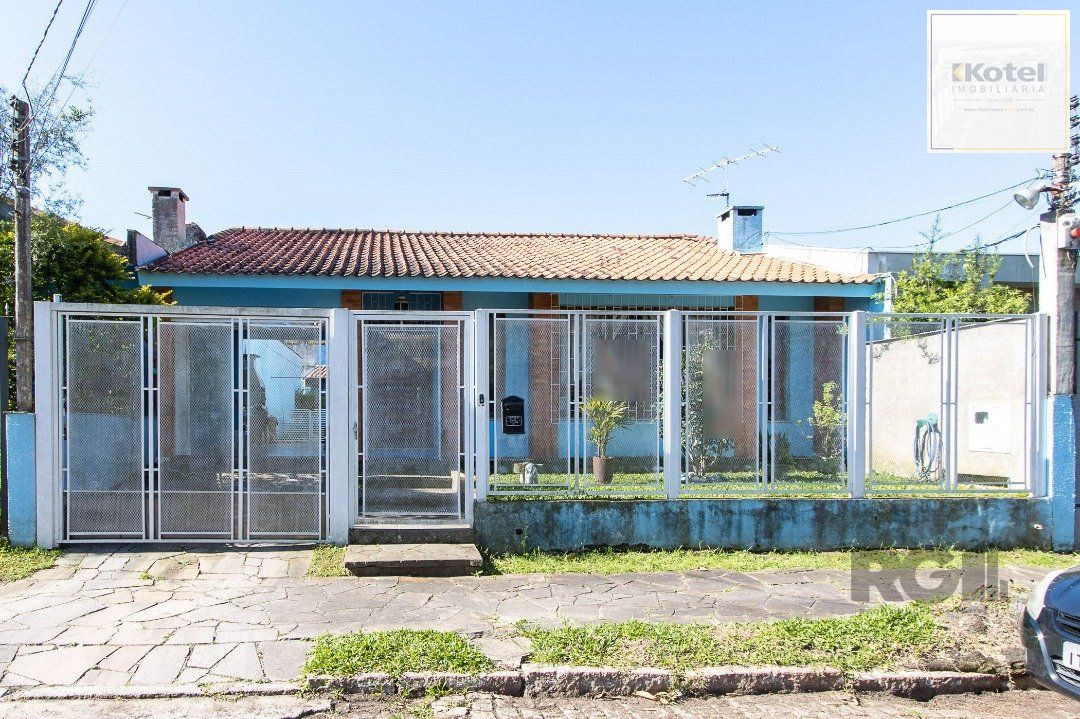 Casa térrea, com 3 dormitórios, 1 suíte, no bairro Ipanema. — foto 2