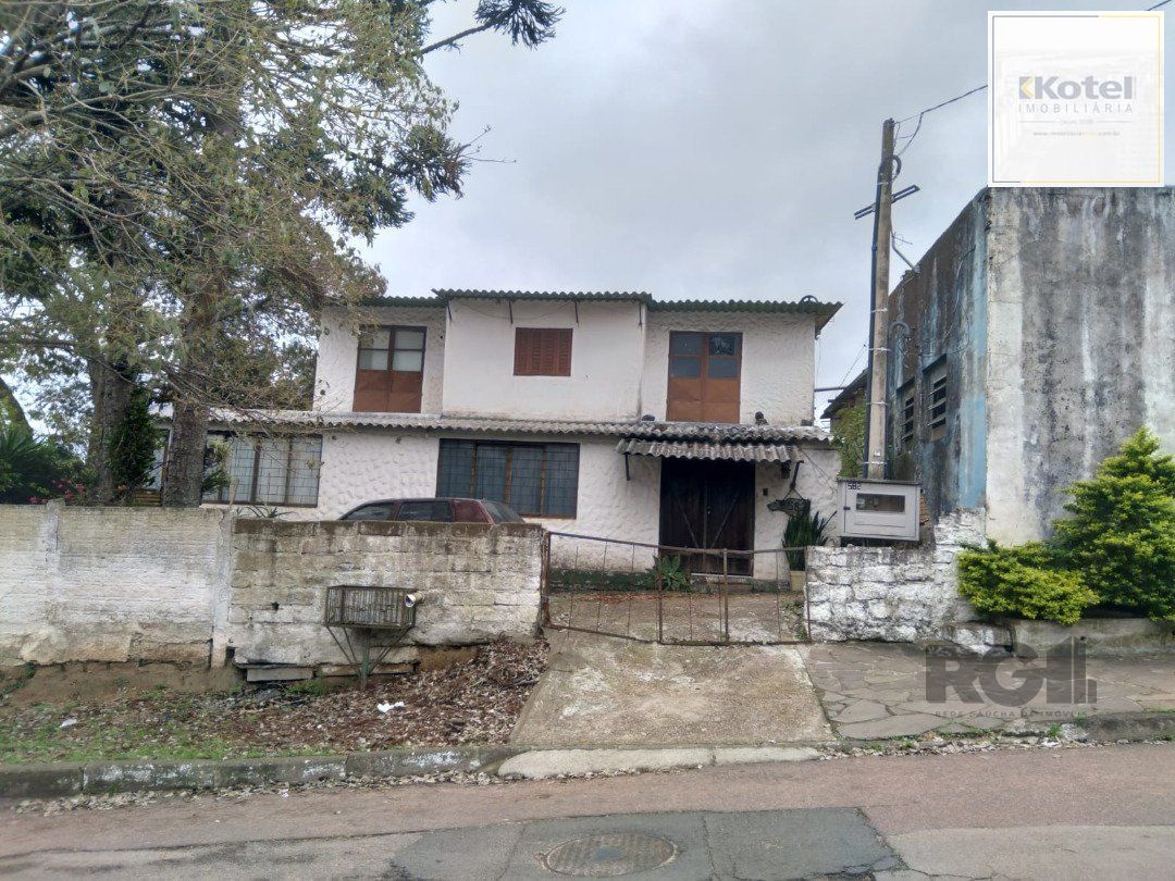 Casa 5 dormitórios, bairro Camaquã. — foto 2