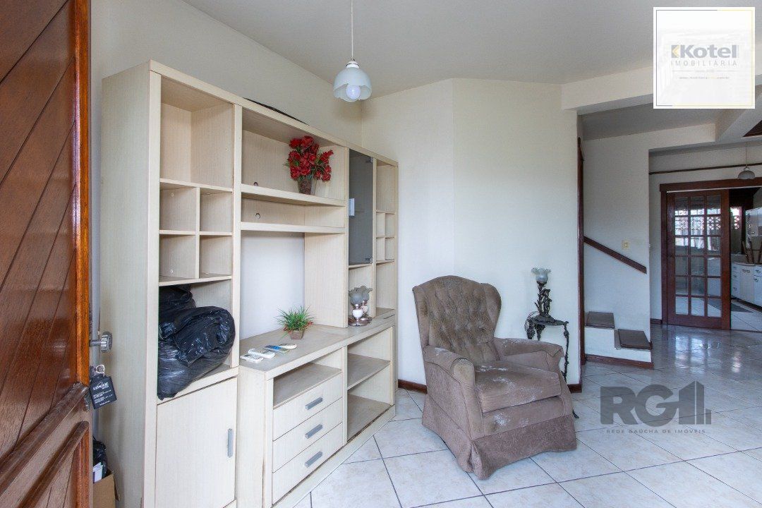 Casa em Condomínio na Zona Sul, no bairro Hípica, com 2 dormitórios, living para dois ambientes, cozinha mobiliada, lavabo — foto 4