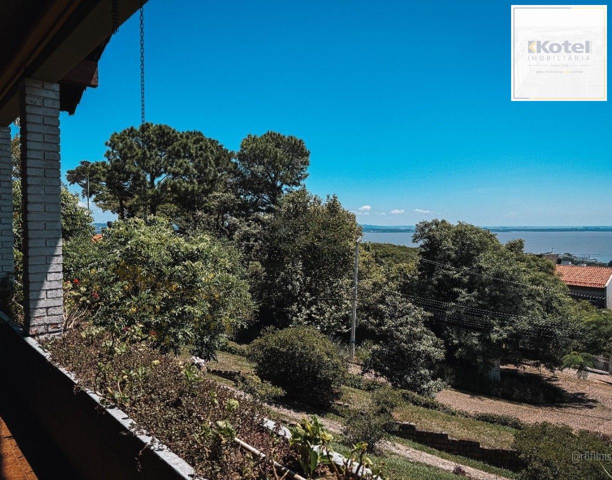 Casa bairro Sétimo Céu, 463m² privativos, vista privilegiada do Rio Guaíba em terreno de 1.423m².