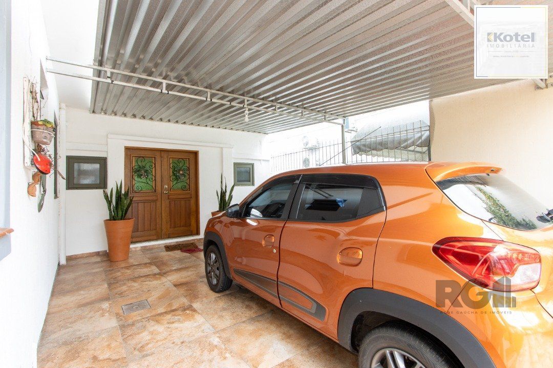 Casa térrea, 3 quartos, edícula, com 2 suites, pátio - Bairro Guarujá — foto 3