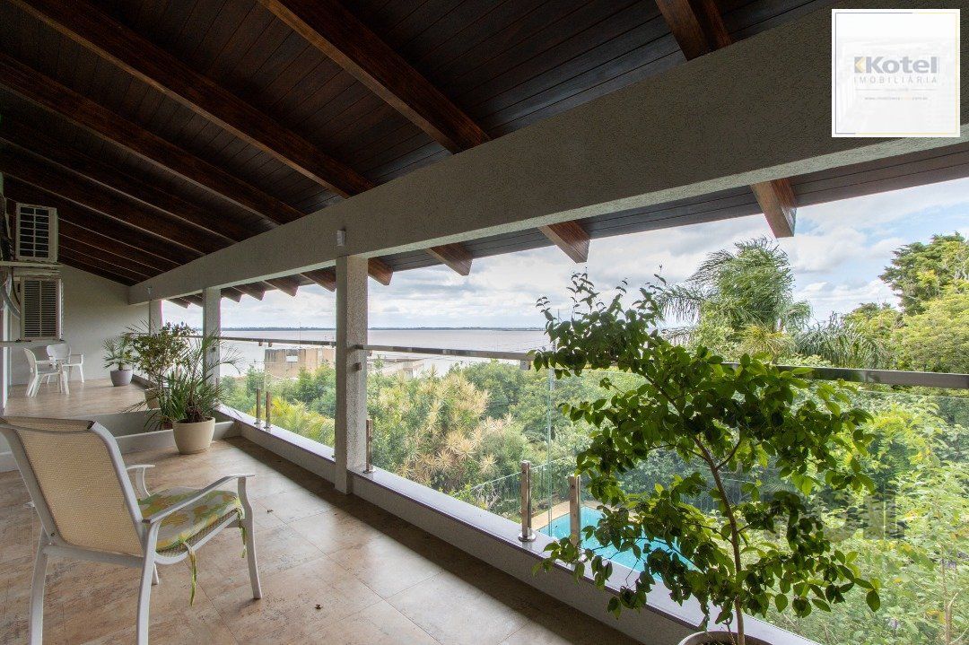 Sobrado com vista para Rio, 3 quartos, 2 suites, pátio, piscina, vaga para 4 carros - Bairro Vila Assunção — foto 4