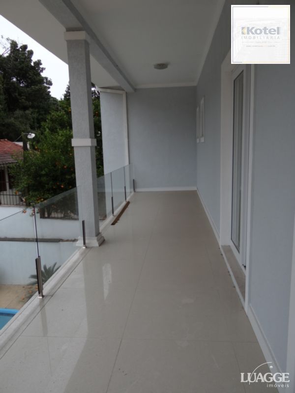 Casa para Venda - 305m², 3 dormitórios, sendo 3 suites, 4 vagas - Nonoai — foto 2