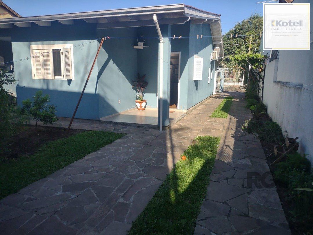 Casa com 250m²,  2 quartos, 1 suite, edícula, no bairro Nonoai — foto 3