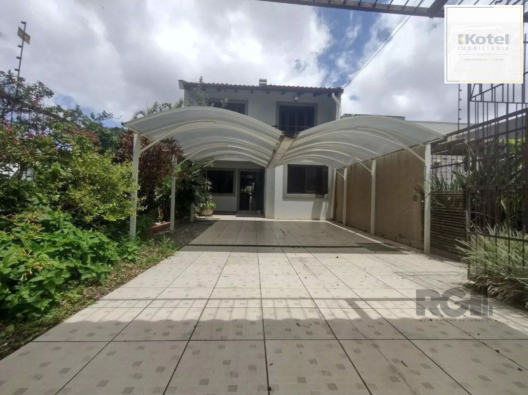 Casa 4 dormitórios, Bairro Cavalhada. — foto 3