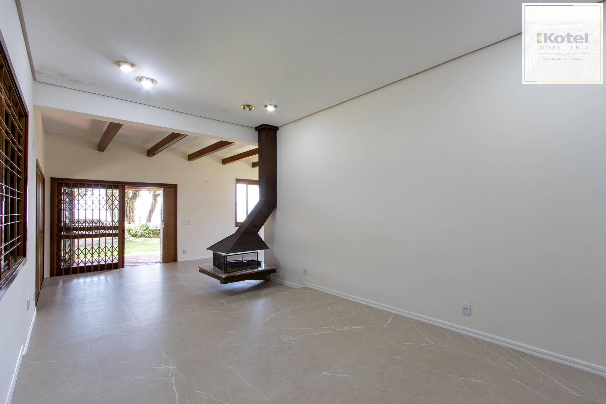 Casa com 2 dormitórios 3 banheiros. lareira e churrasqueira, e com arquitetura moderna. — foto 3