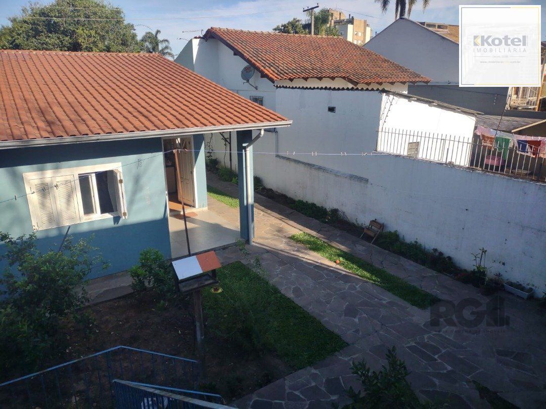 Casa com 250m²,  2 quartos, 1 suite, edícula, no bairro Nonoai — foto 2