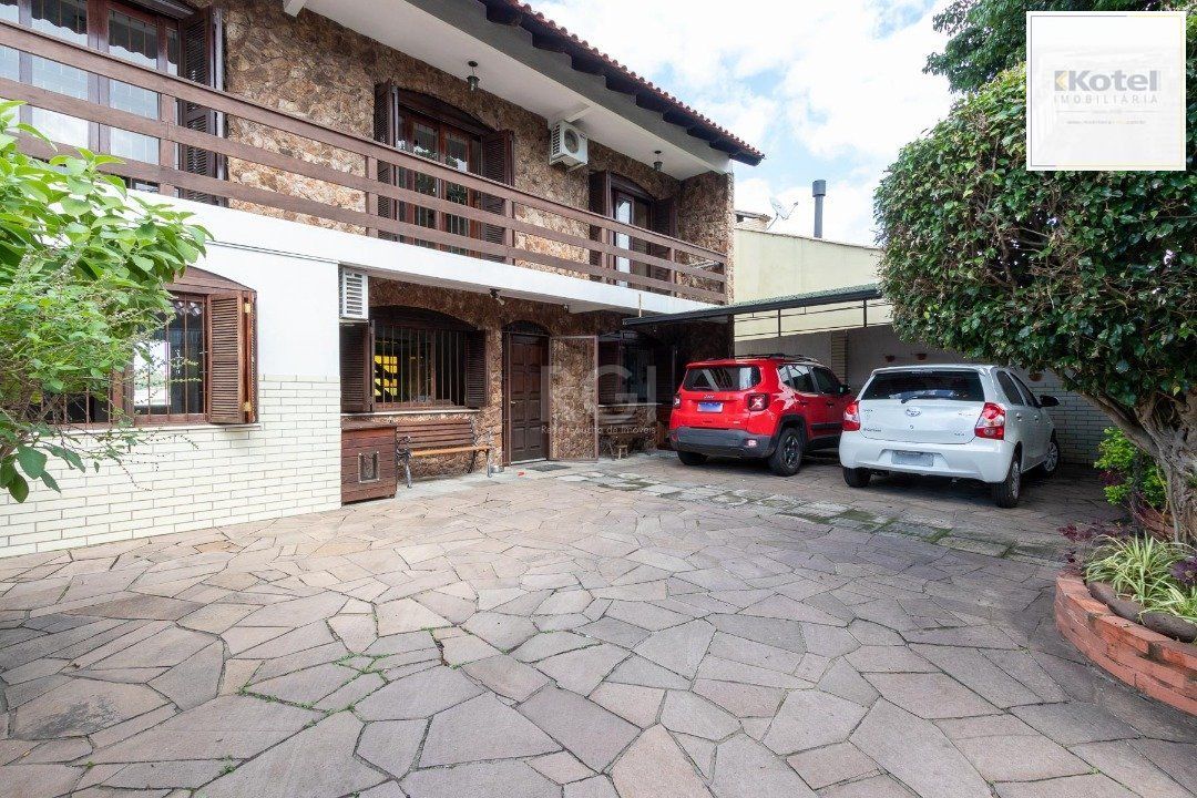 Casa para Venda - 300m², 5 dormitórios, 2 vagas - Cavalhada — foto 2