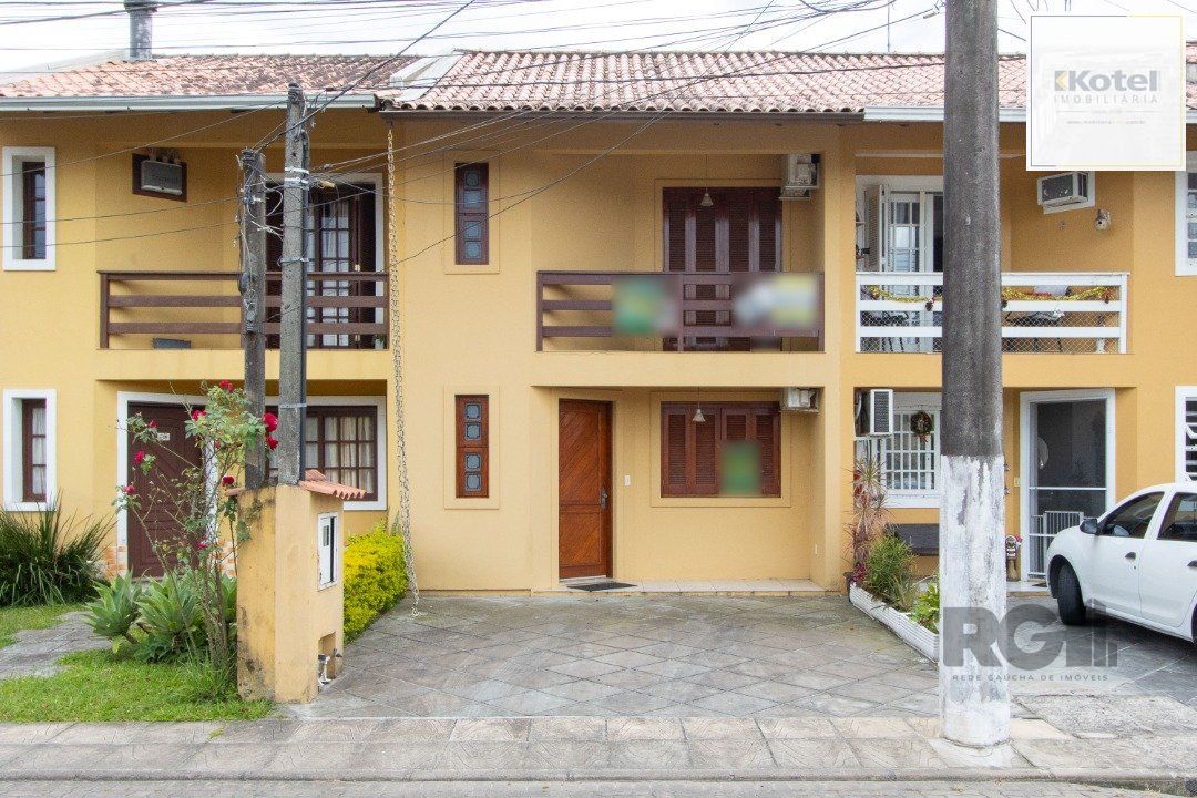 Casa em Condomínio na Zona Sul, no bairro Hípica, com 2 dormitórios, living para dois ambientes, cozinha mobiliada, lavabo — foto 2
