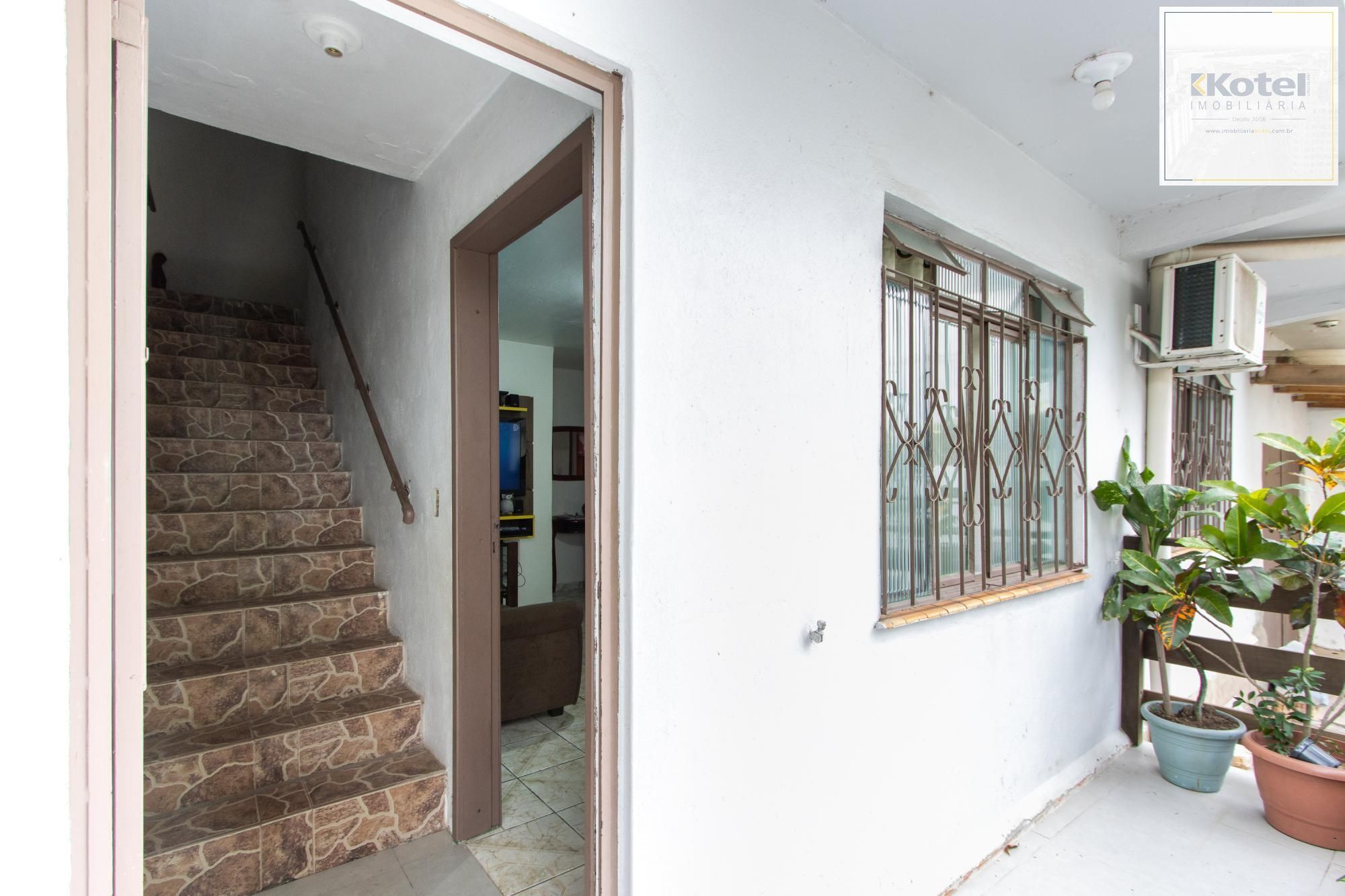 Casa ampla de 2 pavimentos com 4 dormitórios, 1 suite e 4 vagas no bairro Santa Tereza! — foto 4