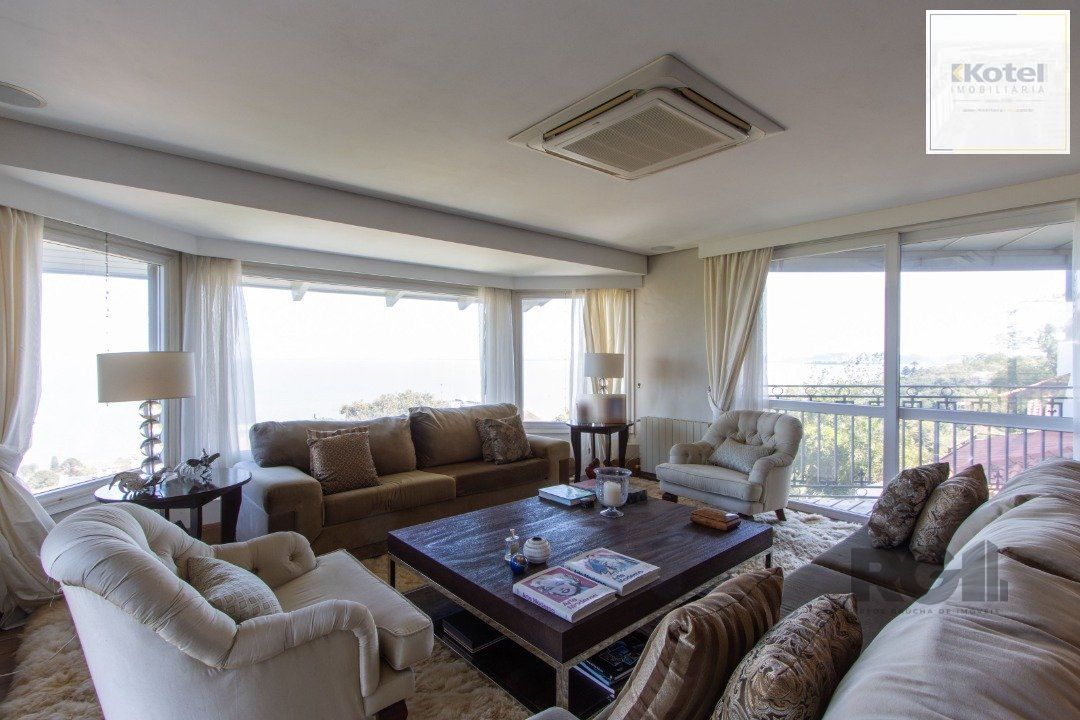 Casa deslumbrante vista do Guaiba, 3 dormitórios, sendo 1 suite master com closet e banheira de hidro com vista para o rio — foto 4