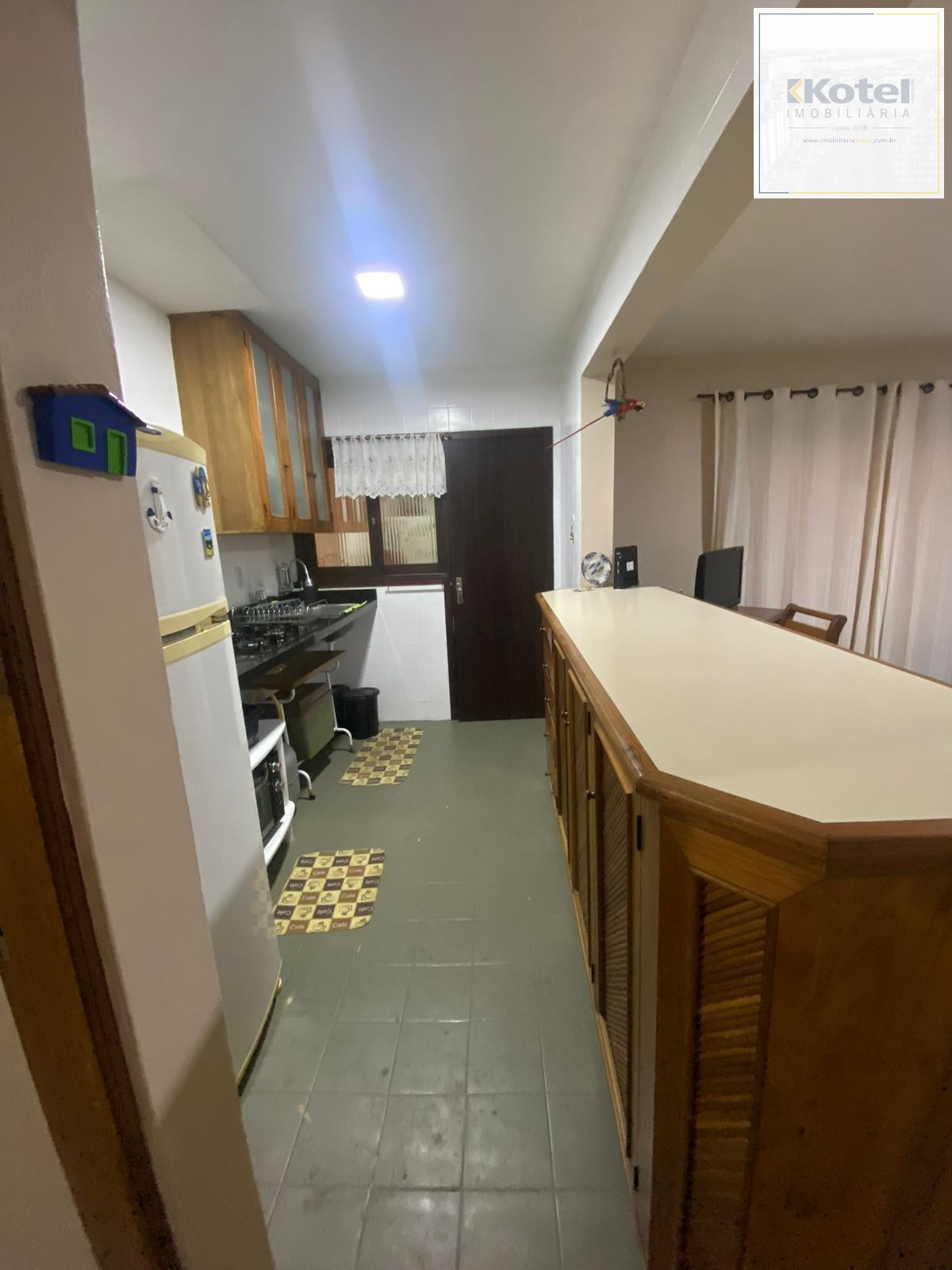 Apartamento com 2 dormitórios e garagem em Torres