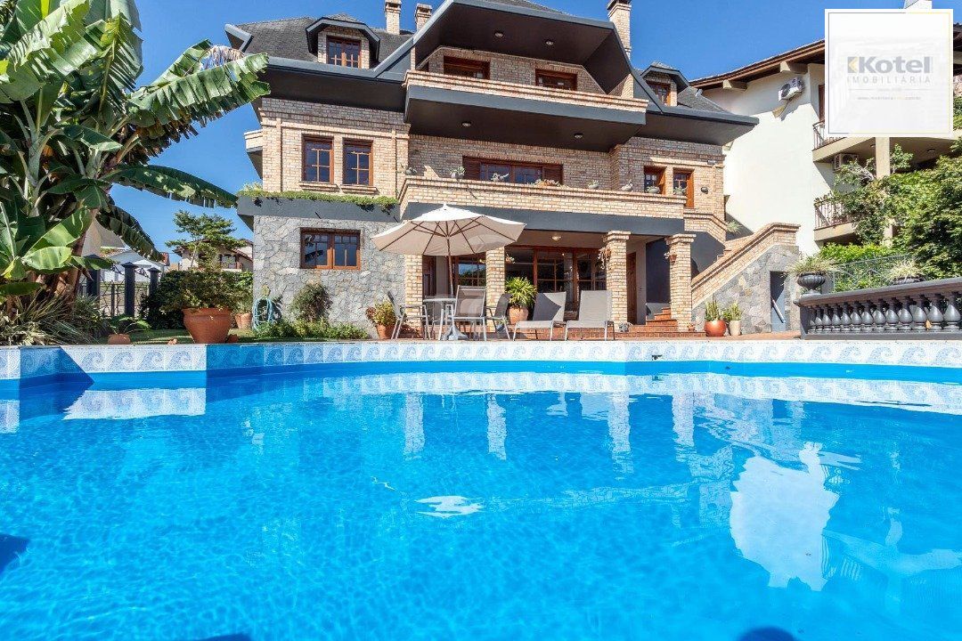 Casa Condominio para Venda - 559m², 4 dormitórios, sendo 3 suites, 3 vagas - Cavalhada — foto 2