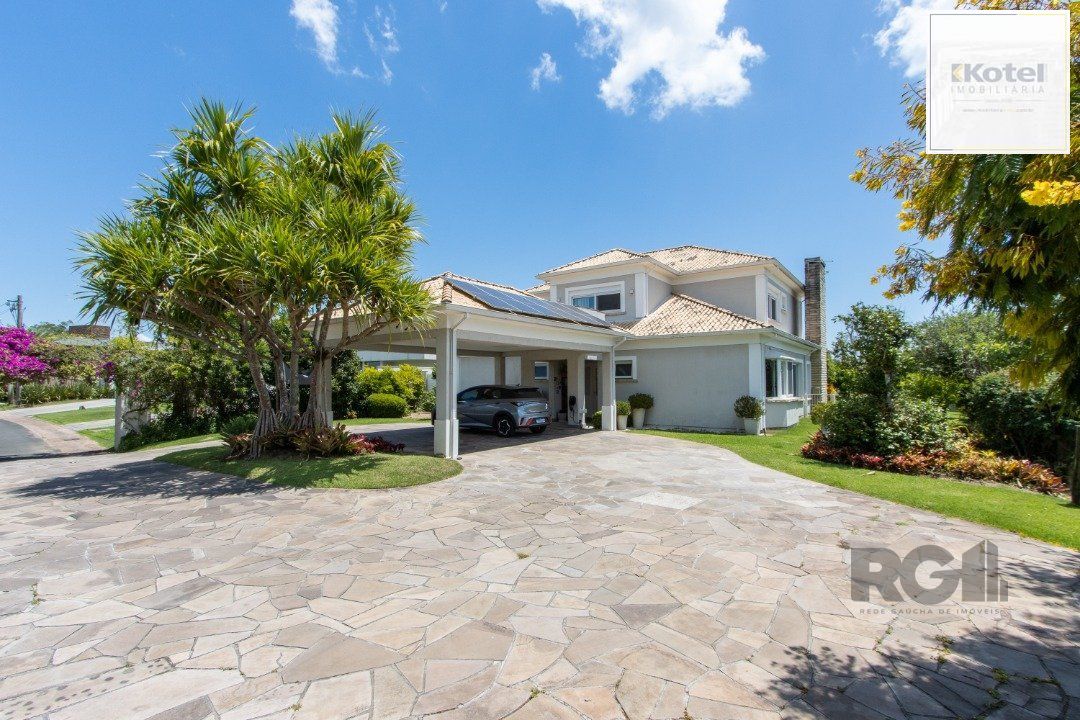 Excelente residência no Condomínio Terra Ville com aproximadamente 474,74m² privativos.