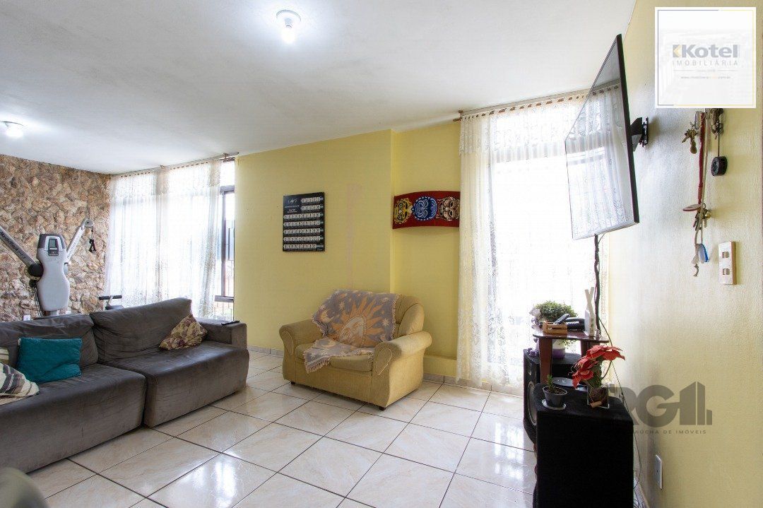 Casa térrea, 3 quartos, 2 banheiros, com pátio no Bairro Cavalhada — foto 5