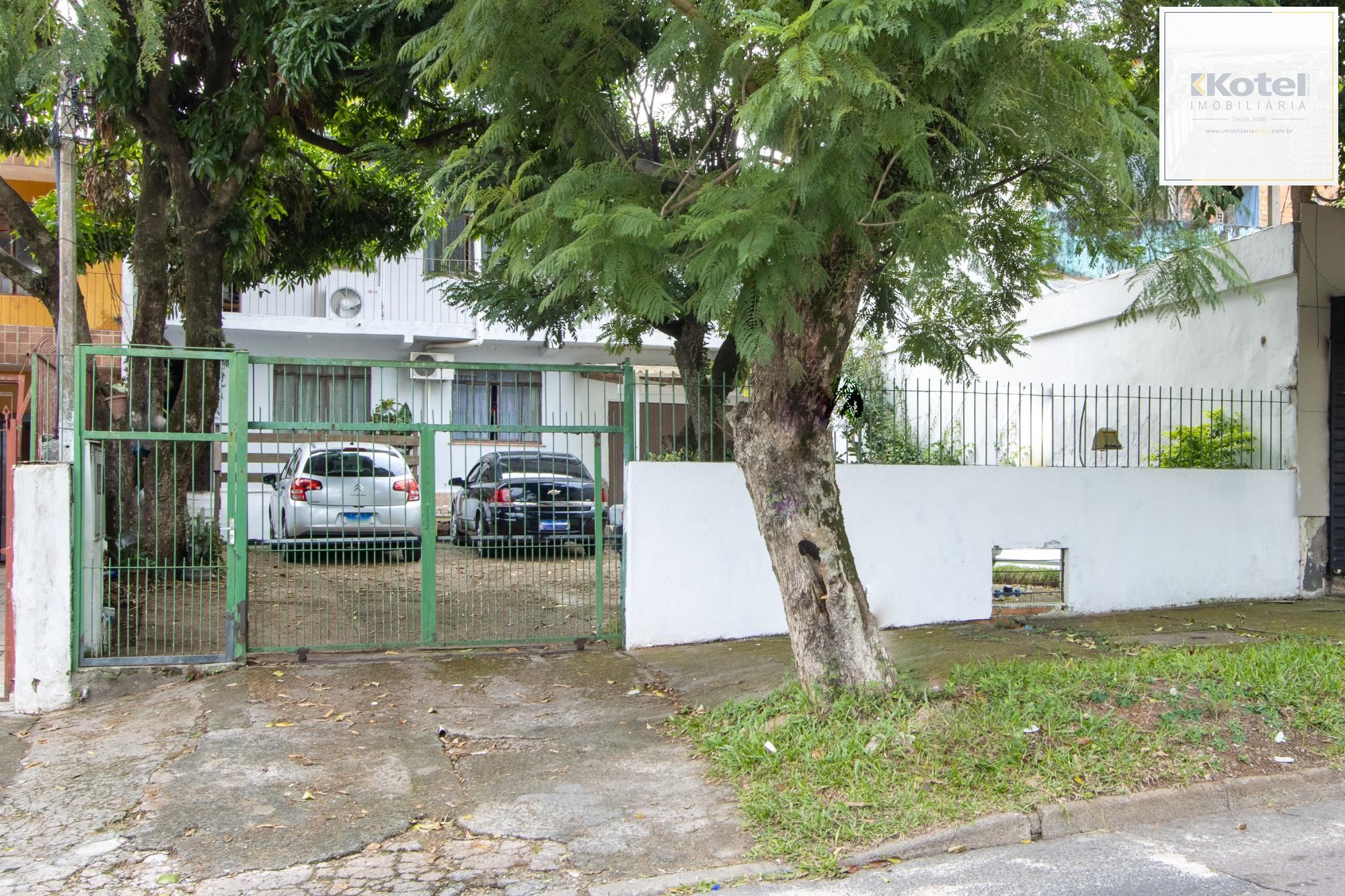 Casa ampla de 2 pavimentos com 4 dormitórios, 1 suite e 4 vagas no bairro Santa Tereza! — foto 2
