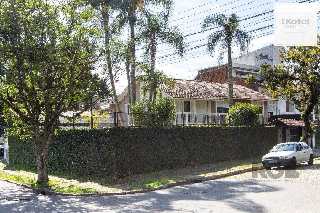 Casa a venda no bairro Guarujá com 4 dormitórios, piscina e salão de festas — foto 3