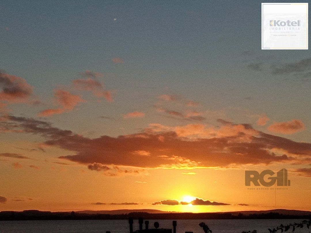 residência com vista panorâmica espetacular para o Guaíba em todos os cômodos da casa, hall de entrada, gabinete, lavabo, living para três ambientes com sacada e vista — foto 4