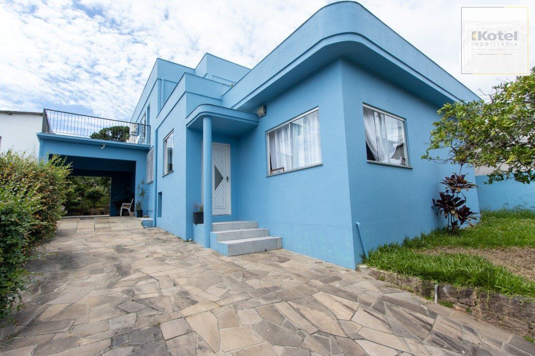 Casa, 5 dormitórios, sendo 1 suíte, 312m² privativos, 8 vagas - Bairro Vila Nova — foto 3