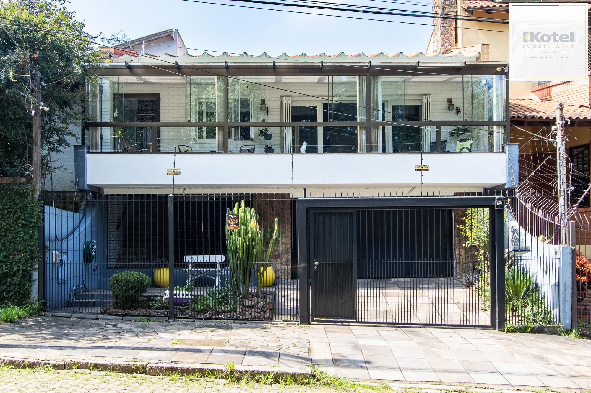 Linda casa totalmente reformada, 3 quartos (1 suite), 2 vagas cobertas - Bairro Nonoai — foto 2