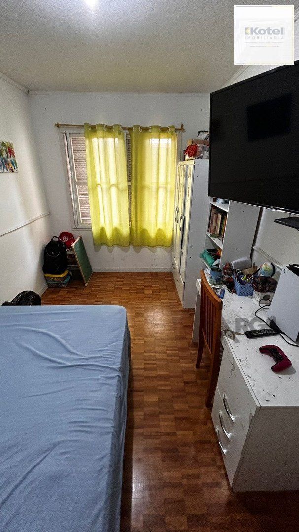 Apartamento de 2 dormitórios, living, cozinha, área de serviço e banheiro social. — foto 4