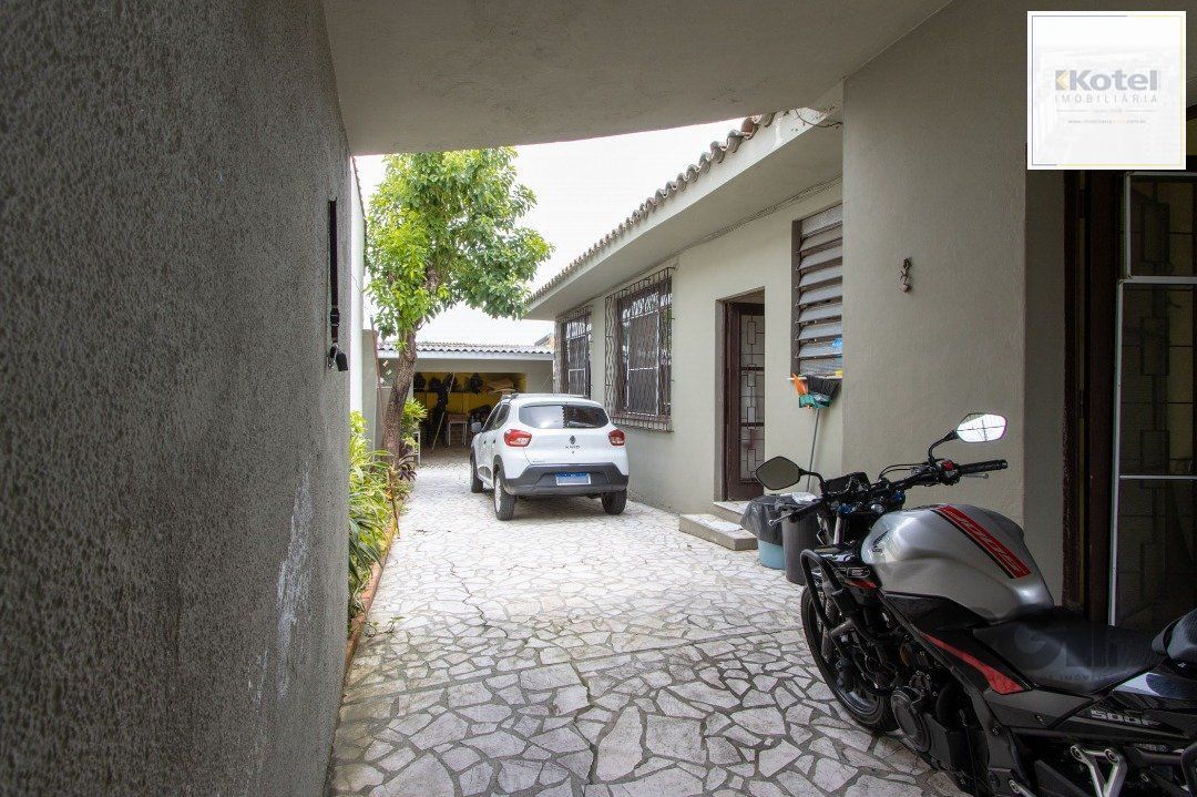 Casa térrea, 3 quartos, 2 banheiros, com pátio no Bairro Cavalhada — foto 3