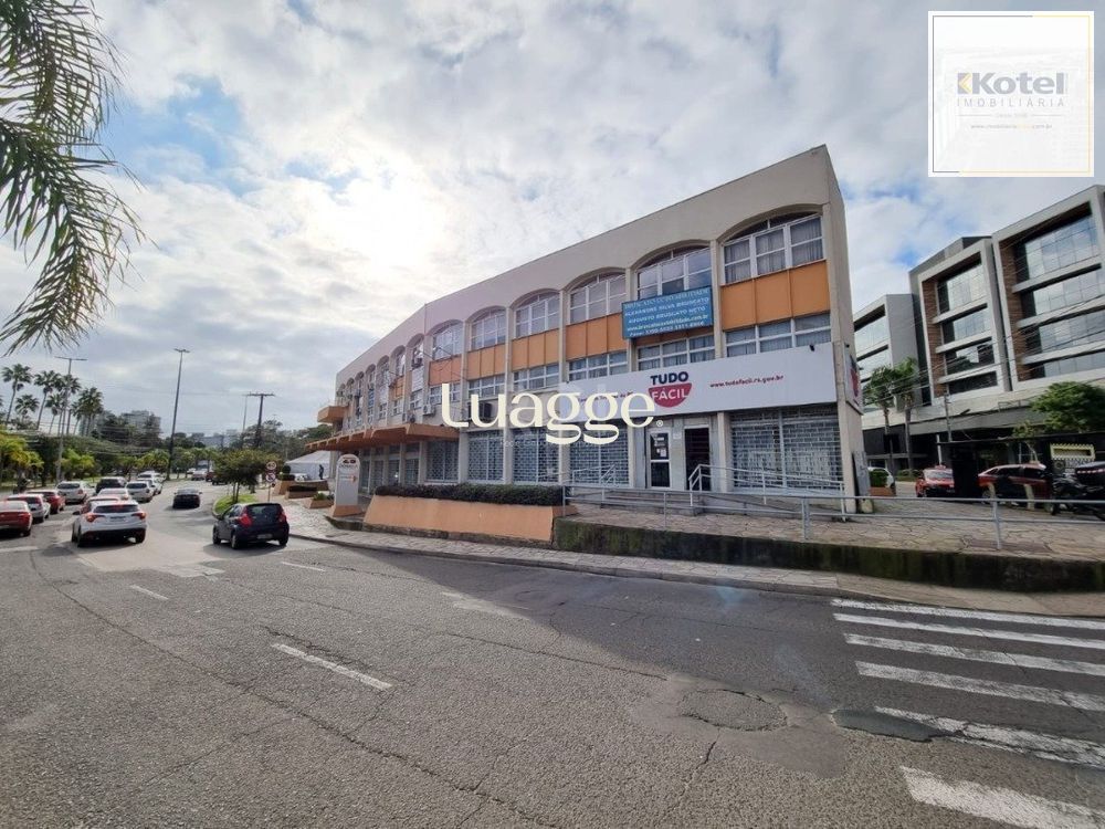 Sala comercial com 22m² de área privativa, frente, piso cerâmico, equipada com lavabo e ar-condicionado split