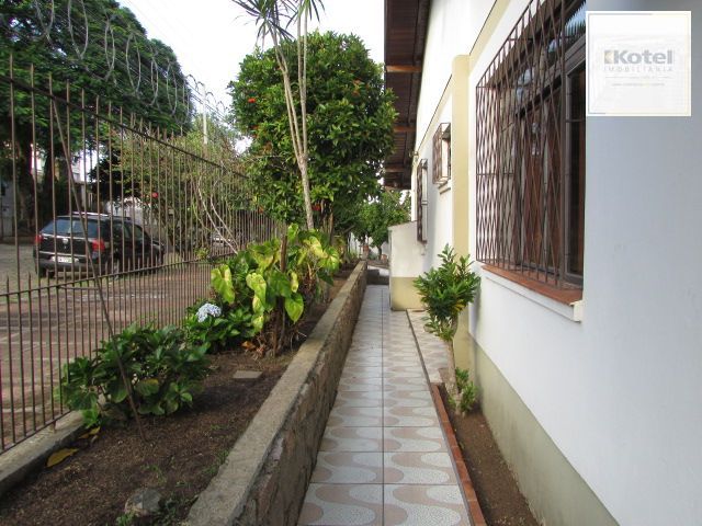 Casa térrea, com 3 dormitórios, 1 suíte, no bairro Nonoai. — foto 5