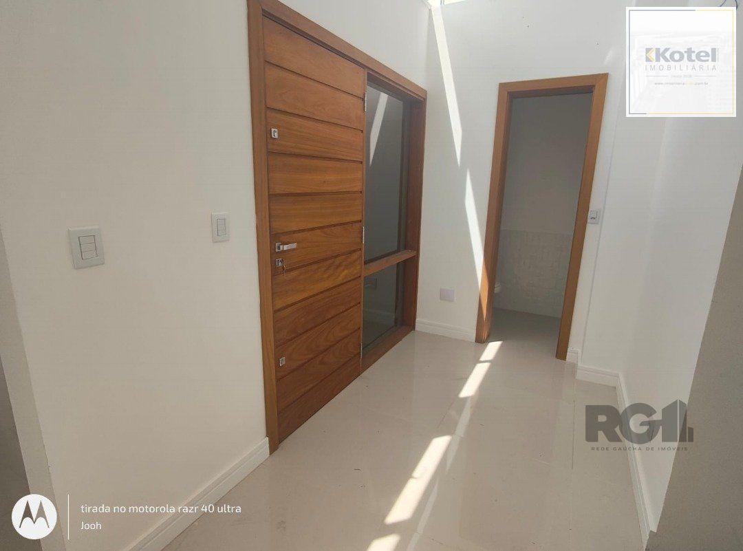 Casa em Condomínio fechado com 3 dormitórios no bairro Vila Nova em Porto Alegre, RS — foto 2