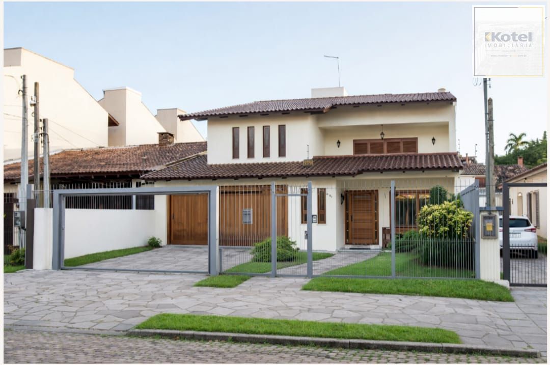Casa à venda com 5 dormitórios, 392m² e 4 vagas no bairro Vila Assunção, Zona Sul de Porto Alegre