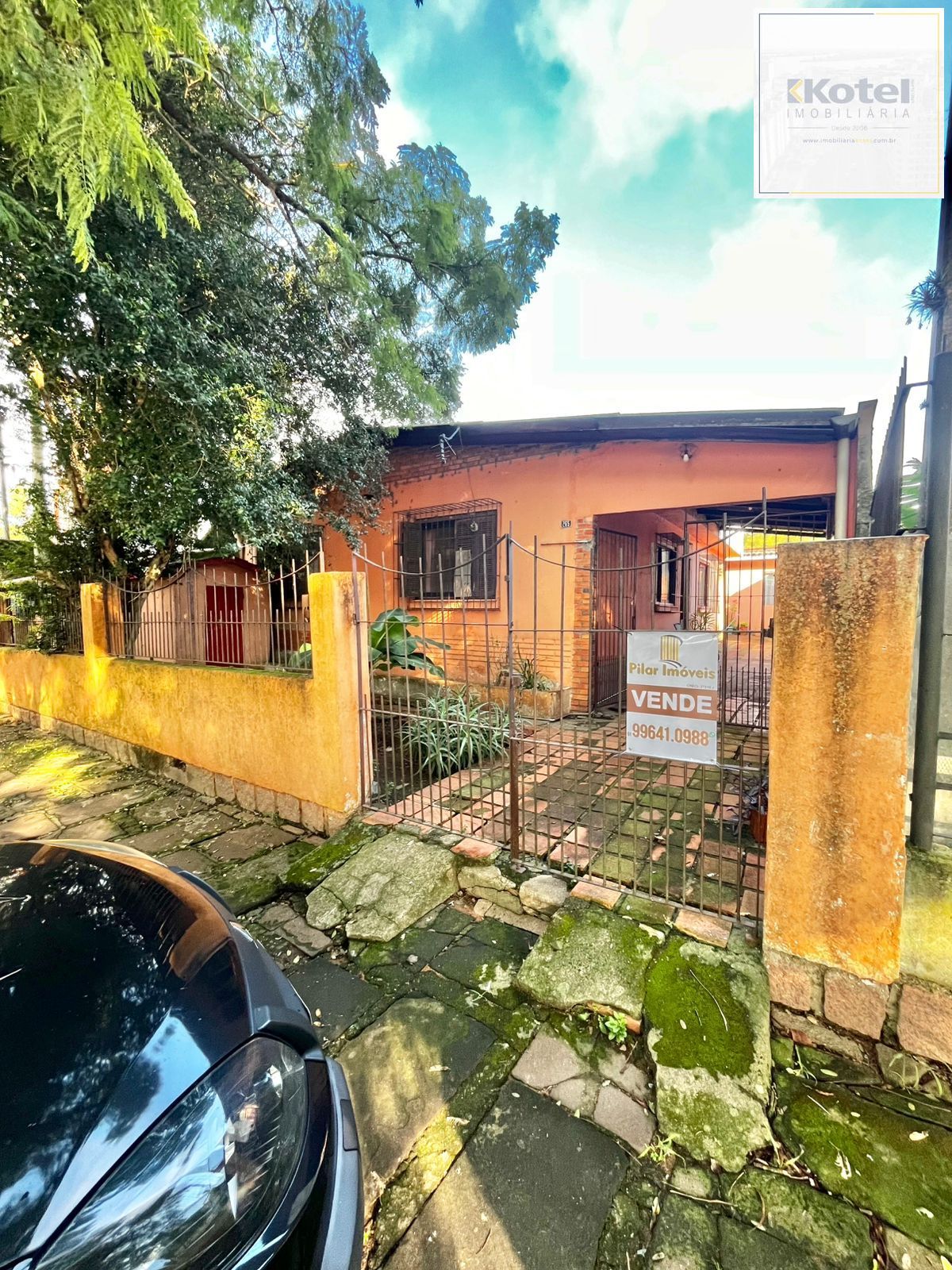 Casa na Rua Marista, Partenon, com 11,00 de frente por 23,00 de frente a fundos — foto 2
