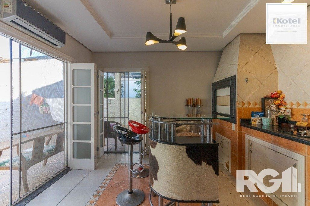 Casa em Condomínio com 3 Suítes, Espaço Gourmet e 5 Vagas de Garagem — foto 3