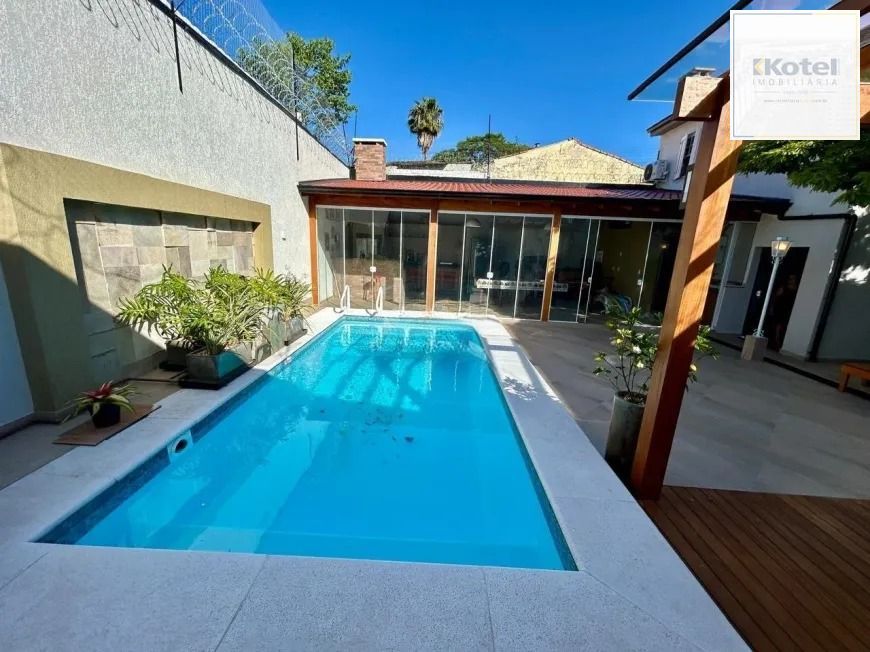 Casa 8 dormitórios, 5 banheiros e 6 vagas no Bairro São João Porto Alegre — foto 3
