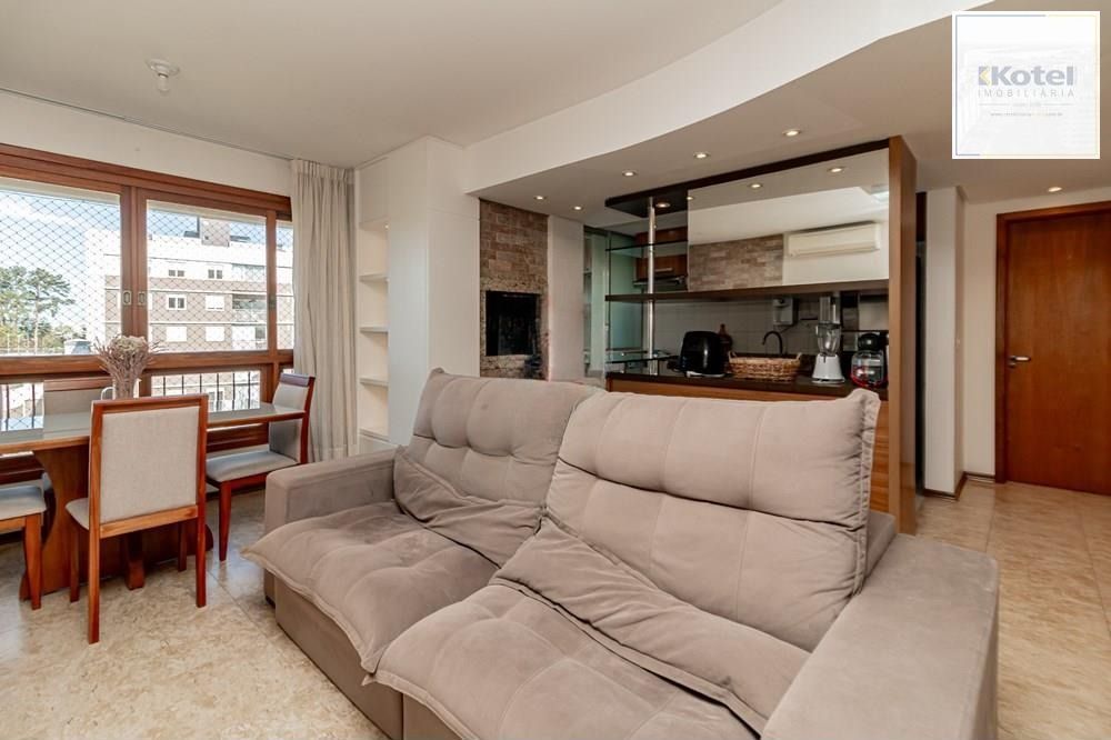 Apartamento com 3 dormitórios (sendo 1 suíte), 2 banheiros, lareira, churrasqueira e 2 vagas de garagem. — foto 2