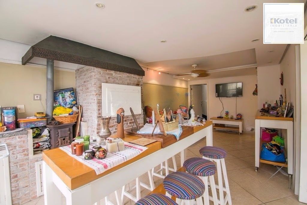Casa de esquina com 6 dormitórios, 430m², piscina, 4 vagas — foto 3