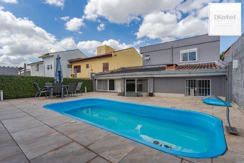 Casa térrea com 3 dormitórios, espaço gourmet e 3 vagas.
