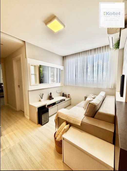 Apartamento à venda com 2 dormitórios, 48m², suíte e vaga de garagem.