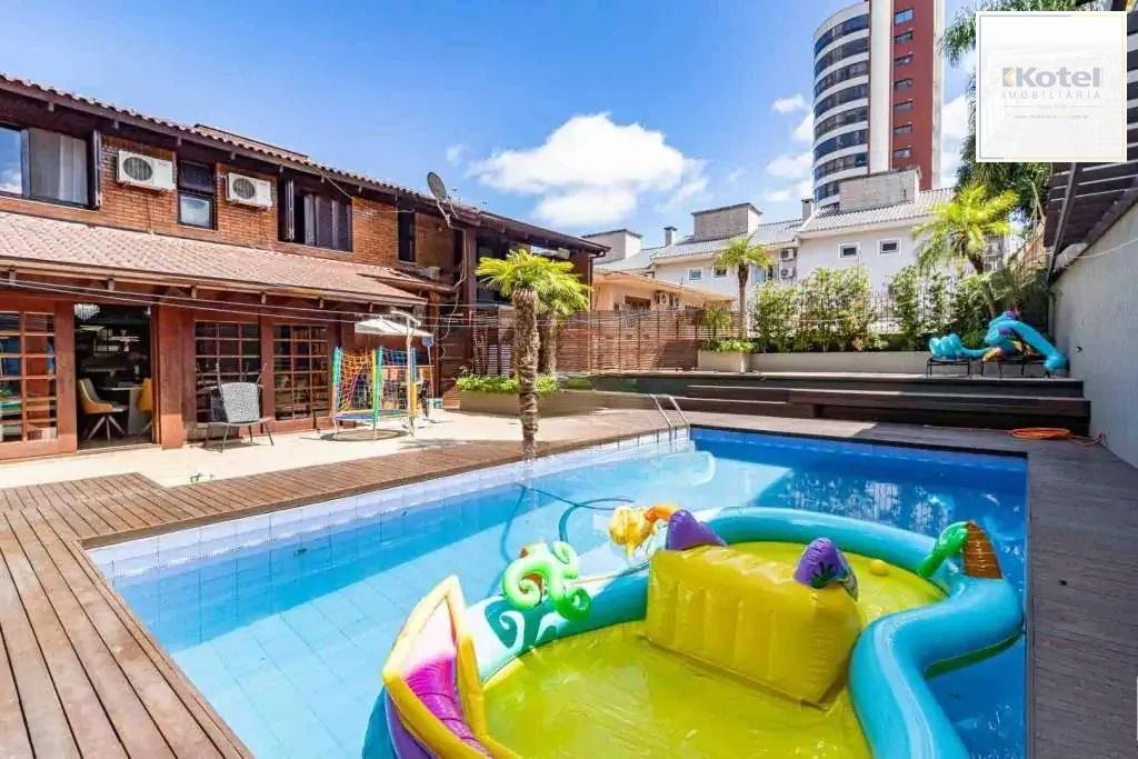 Casa com 4 dormitórios, suíte, piscina e 4 vagas. — foto 3