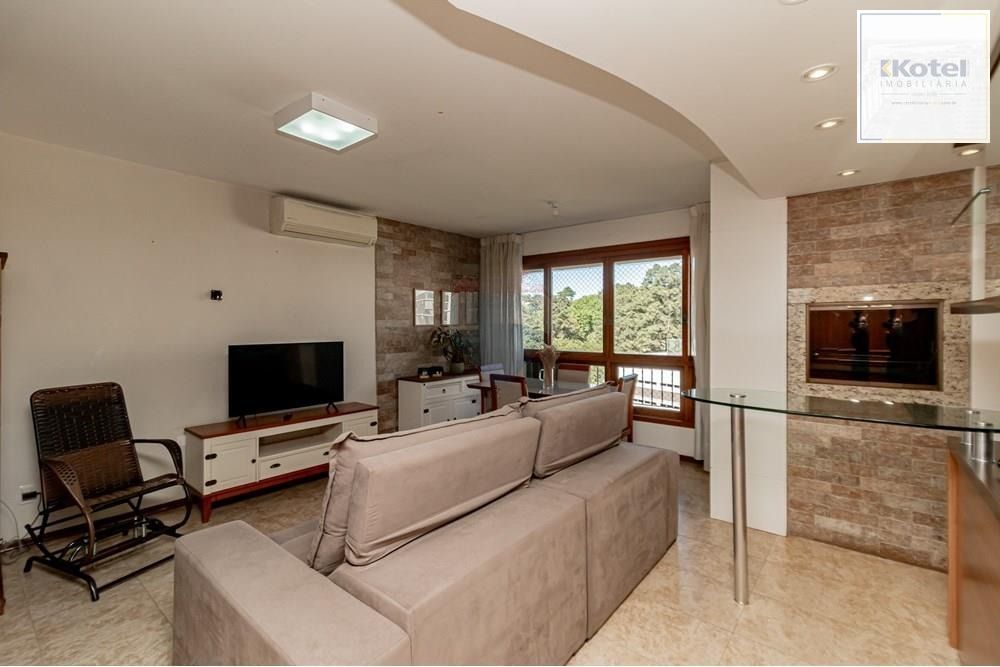 Apartamento com 3 dormitórios (sendo 1 suíte), 2 banheiros, lareira, churrasqueira e 2 vagas de garagem. — foto 3