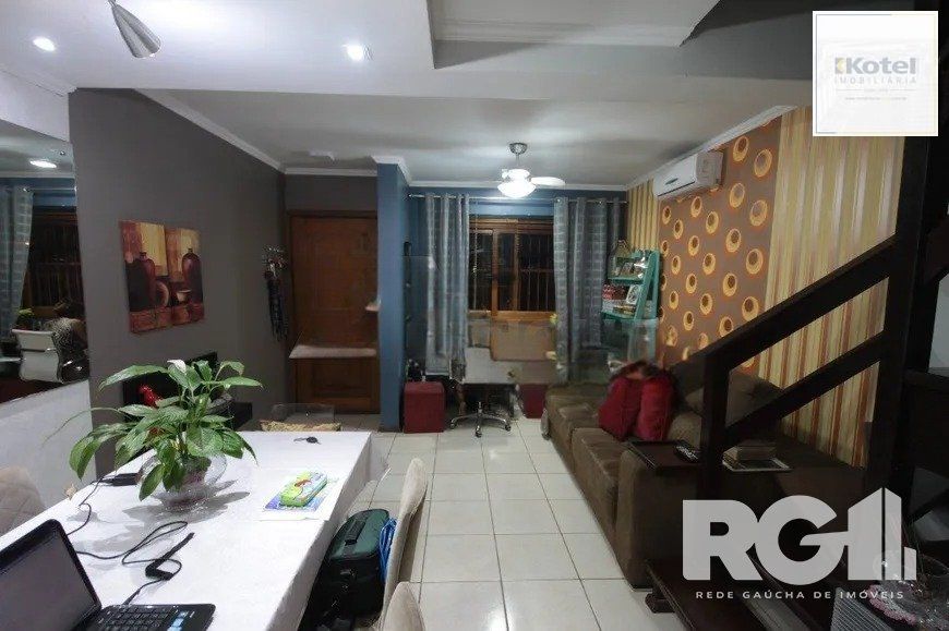 Casa residencial com 3 dormitórios 90m² privativos, e 2 vagas à venda no bairro Parque Santa Fé em Porto Alegre — foto 2