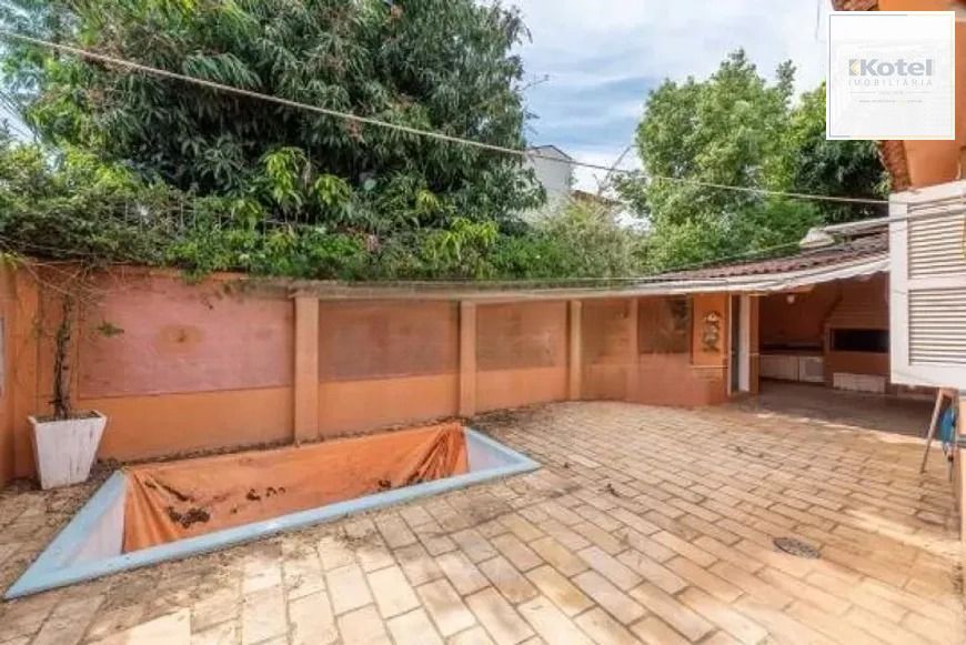 Casa térrea com piscina, jardim e 3 dormitórios Jardim Botanico — foto 2