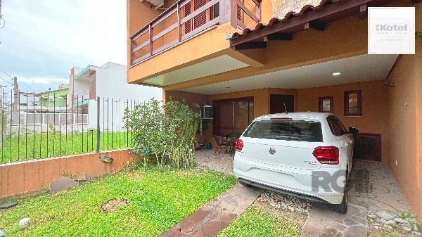 Casa em Porto Alegre, no bairro Hípica, com 3 dormitório(s), e 3 banheiros, à venda. — foto 4