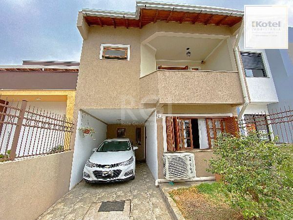 Casa em Porto Alegre, no bairro Hípica, com 3 dormitório(s), e 3 banheiros, à venda. — foto 3