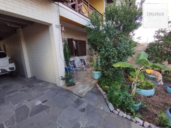 Casa em Porto Alegre, no bairro Hípica, com 3 dormitório(s), e 3 banheiros, à venda. — foto 3