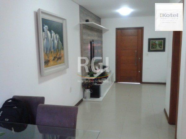 Casa em Porto Alegre, no bairro Hípica, com 3 dormitório(s), à venda. — foto 2