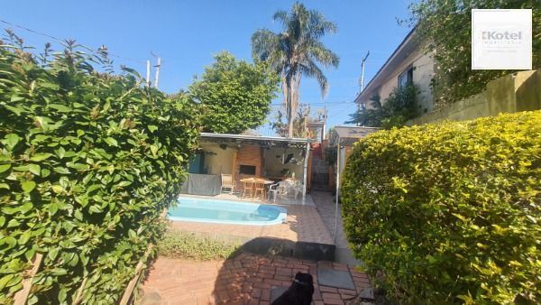 Casa em Porto Alegre, no bairro Nonoai, com 3 dormitório(s), e 3 banheiros, à venda. — foto 5