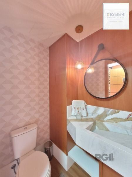 Apartamento em Porto Alegre, no bairro Cavalhada, com 3 dormitório(s), e 3 banheiros, à venda. — foto 4