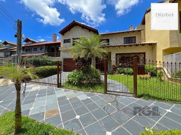 Casa em Porto Alegre, no bairro Ipanema, com 3 dormitório(s), e 3 banheiros, à venda. — foto 2